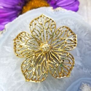 Vintage Gerry's gold flower brooch